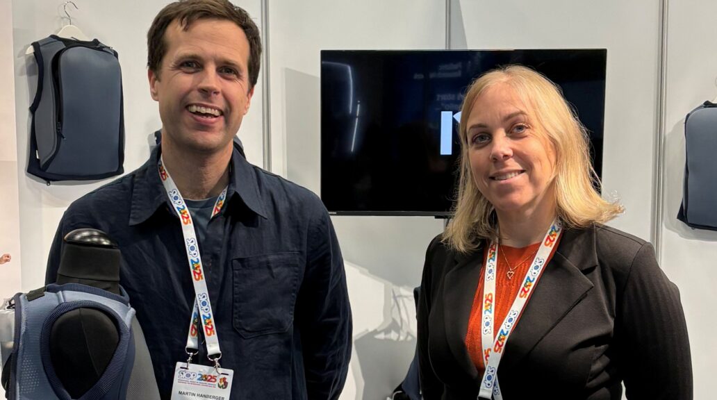 Nil Medical representatives standing on a fair.